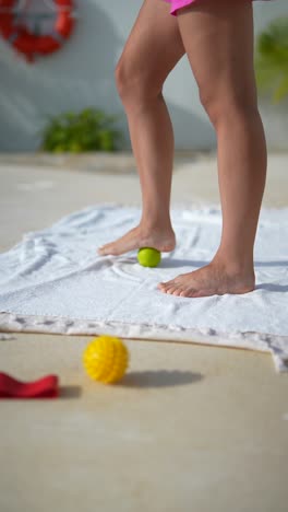 foot massage with therapy ball