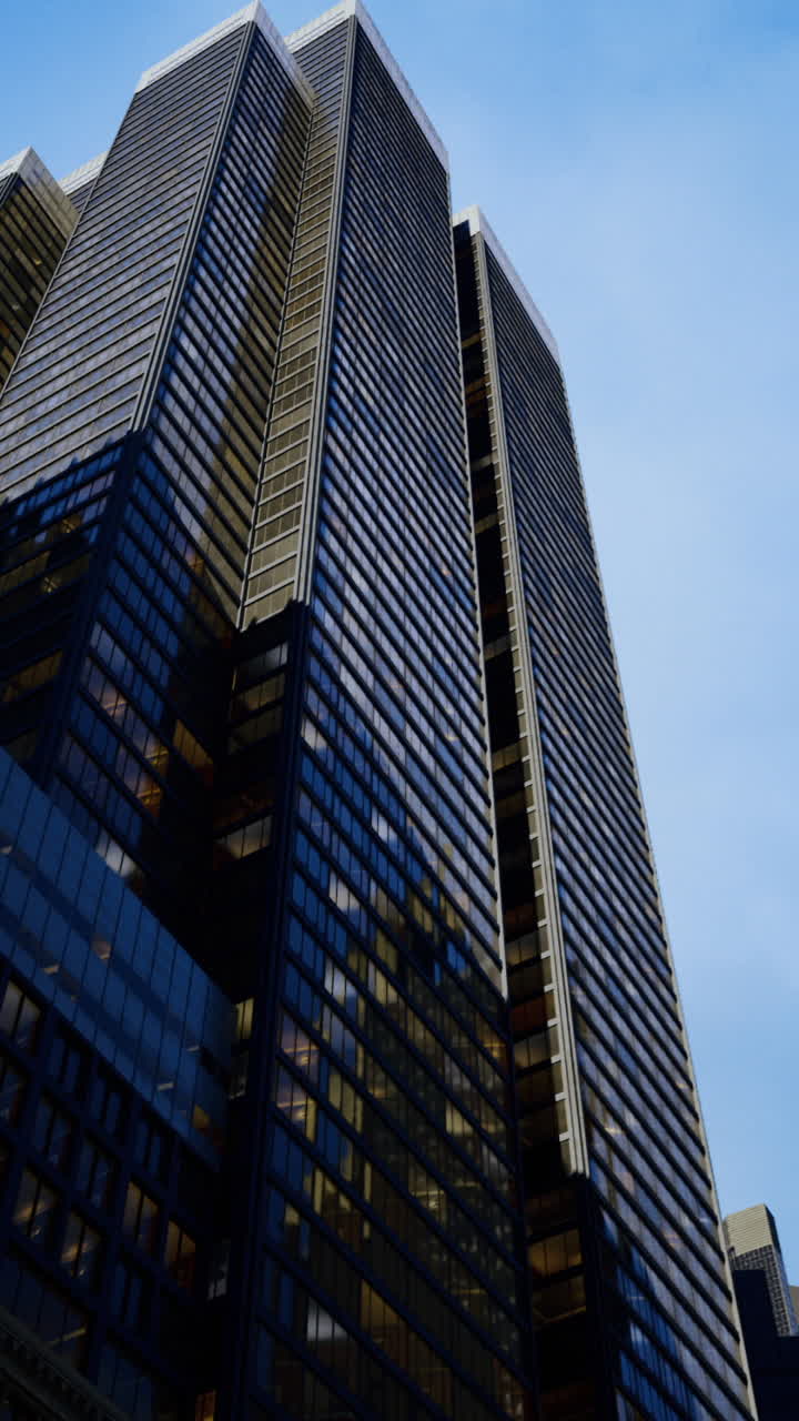 Modern skyscrapers reach towards the sky in a vibrant cityscape