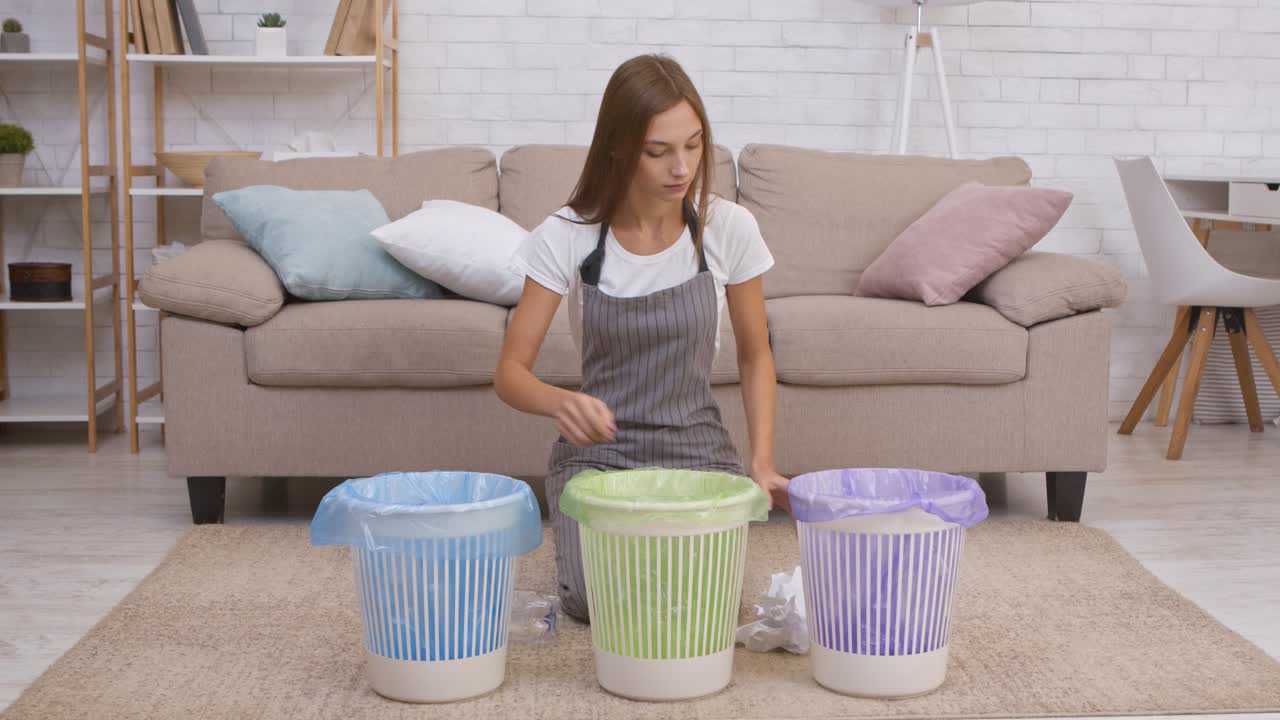 Woman Sorting Trash and Recycling