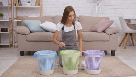 woman sorting trash and recycling