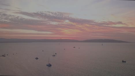 4K-aerial-shot-of-Paracas,-Peru-shoreline-at-sunset