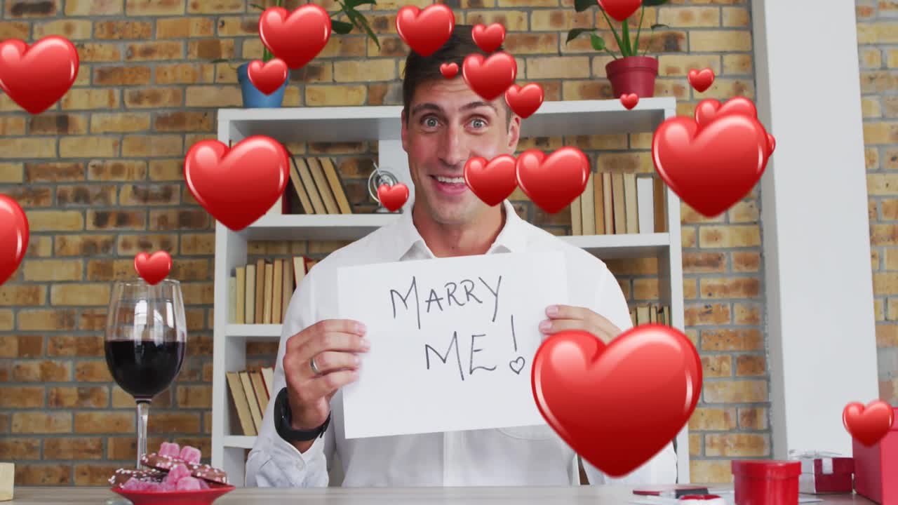 비디오 통화로 청혼하는 백인 남성에 대한 빨간 마음의 애니메이션