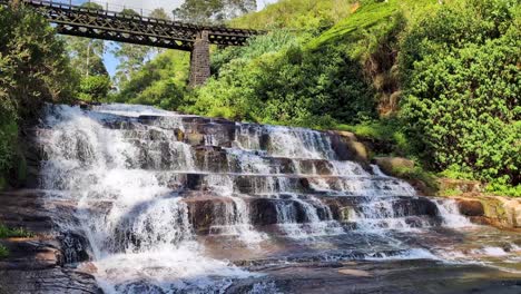 scenic view of nanu oya waterfall with cascading free flowing water in highlands of sri lanka