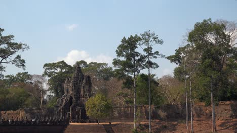 Wide-Exterior-Timelapse-Shot-of-Clouds-Over-Temple-Gate-in-the-Day