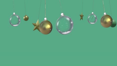 Animation-of-christmas-baubles-on-green-background-with-copy-space
