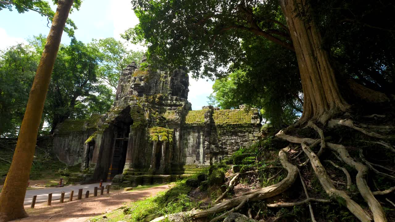 Pan shot of a morning at Bayon temple, Cambodia