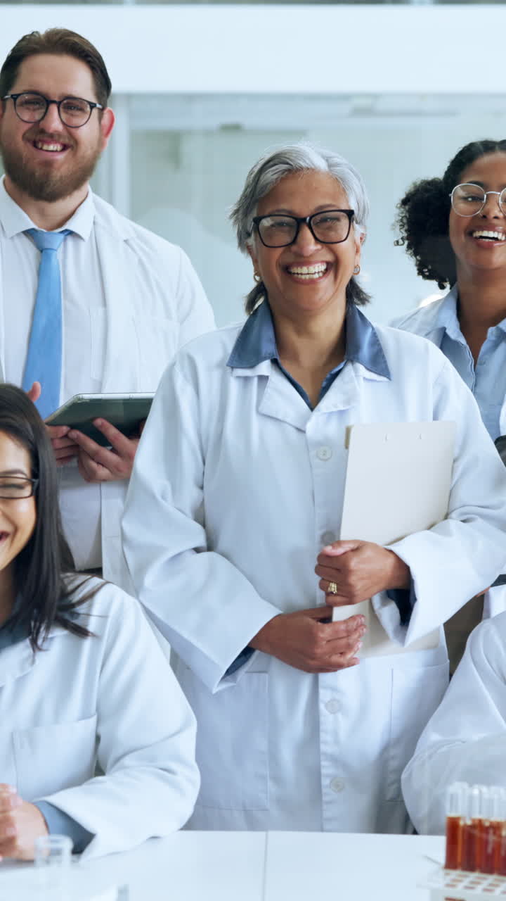 Diverse Group of Smiling Scientists Posing in a Modern Laboratory