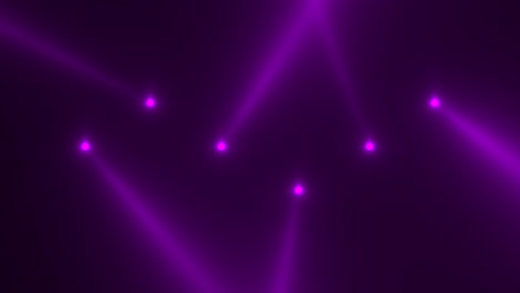 purple glowing spotlight beams on black gradient stage