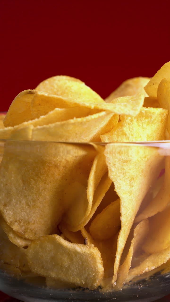 Crispy Potato Chips in Glass Bowl