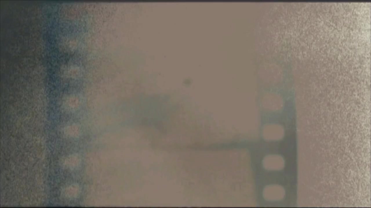 Transizione Bruciatura Pellicola Vintage con Fuoriuscite di Luce e Grana