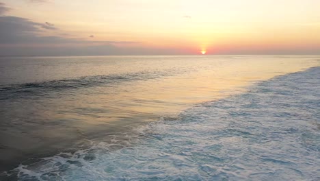 aerial view of gili trawangan island coastline, indonesia with sunset sunlight