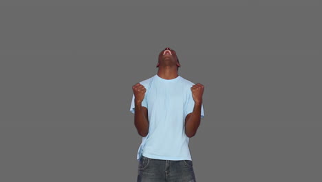 casual young man shouting and cheering
