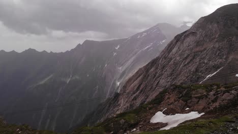 Steep-Mountains-Alps-Of-Kitzsteinhorn-Against-Clouded-Sky-In-Kaprun,-Austria