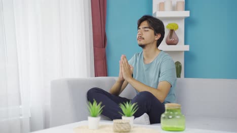 Man-in-meditation-in-front-of-the-window.