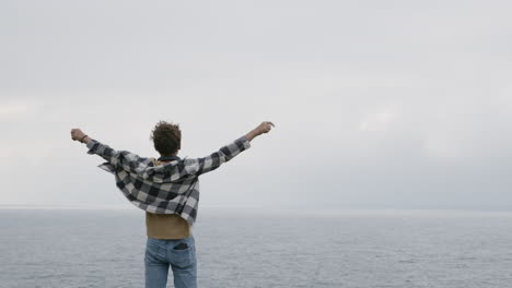 man enjoying a view at the beach