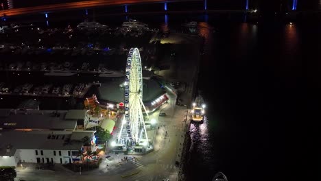 big wheel in the night, miami downtown, florida, united states