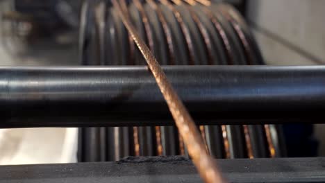 close-up copper wire comes in rolls for the drawing process at the cable factory.