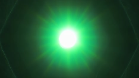 green light rays shining through old camera lens, while diaphragm blades are opening