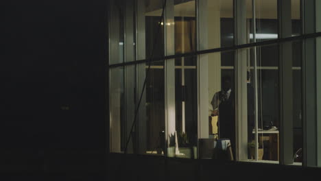 workers in the office at night