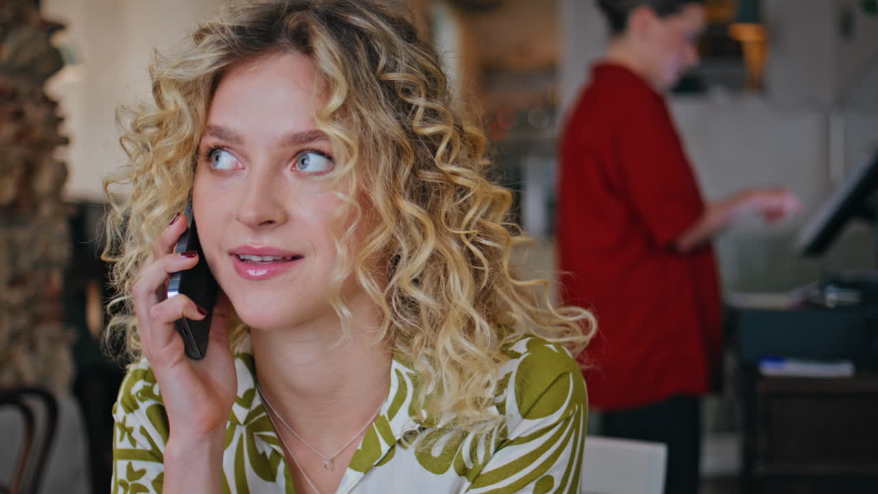 Confident businesswoman calling restaurant closeup. Portrait of blonde talking