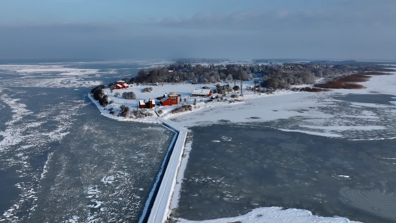 Aerial view bird ringing station Vente cape and pier leading to Curonian lagoon during winter