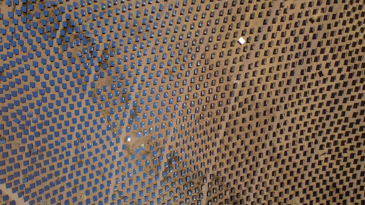 Computerized mirrors following the sun's movement and The light reflected from the mirrors to heat water for energy - Ashalim Power Station, Israel