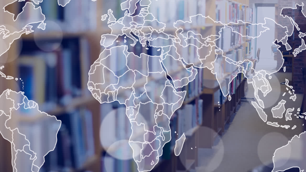 세계 지도의 애니메이션과 선반에 있는 책 위에 반이는 반점