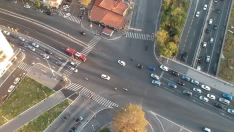 car traffic moving on a crossroad, steady drone