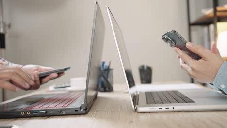 close up shot of businesswoman hands typing on laptop computer keyboard for searching information,online communication support,marketing research,business report in the office desk at night.