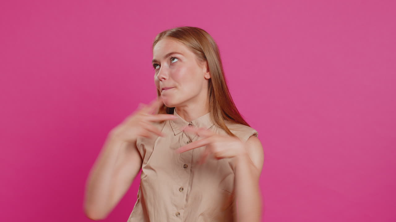 Young woman feeling very proud pointing herself overjoyed by success making choice selfconfident