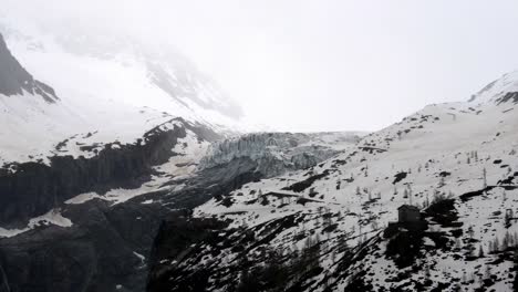 Aerial-take-of-argentière-glacier-in-the-french-alps,-nearby-Chamonix