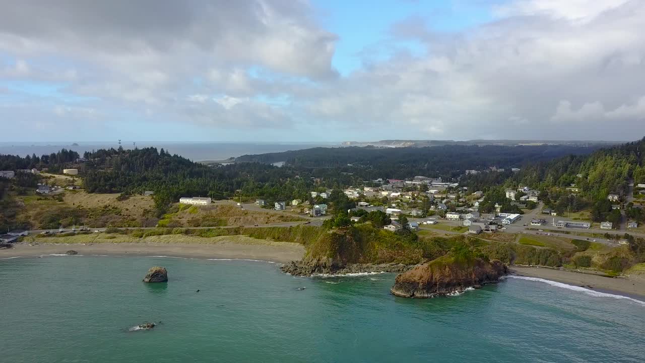 An aerial view of a small seaside village.