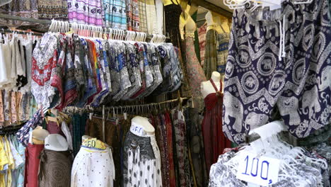 colorful elephant pants for sale in chatuchak market in bangkok, thailand