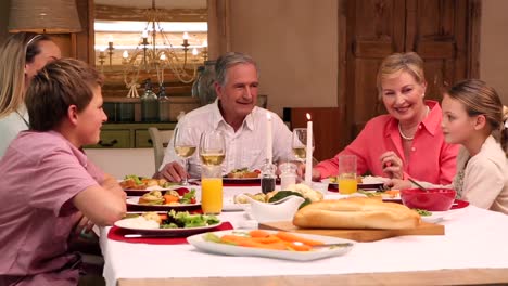 Three-generation-family-having-christmas-dinner-together