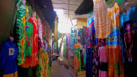 vibrant african market: colorful clothing and textiles