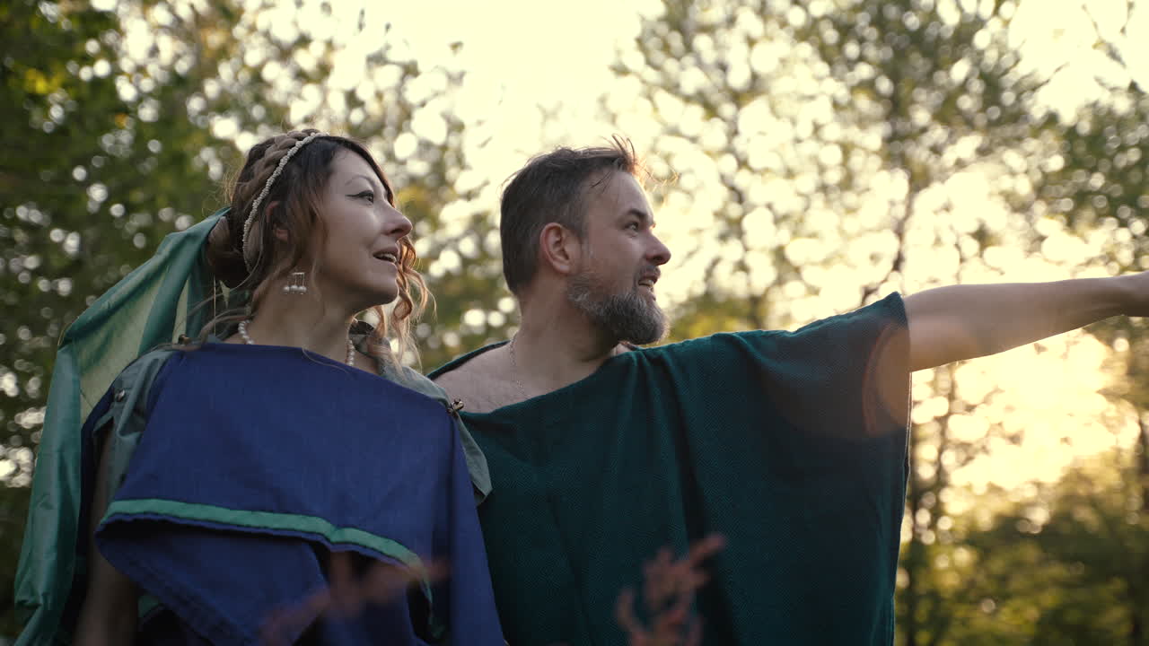 Couple in Historical Clothing in a Forest