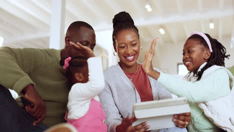 High-five,-tablet-and-parents-playing