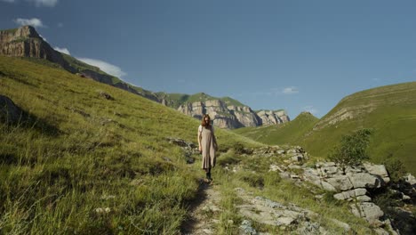 woman hiking in mountains