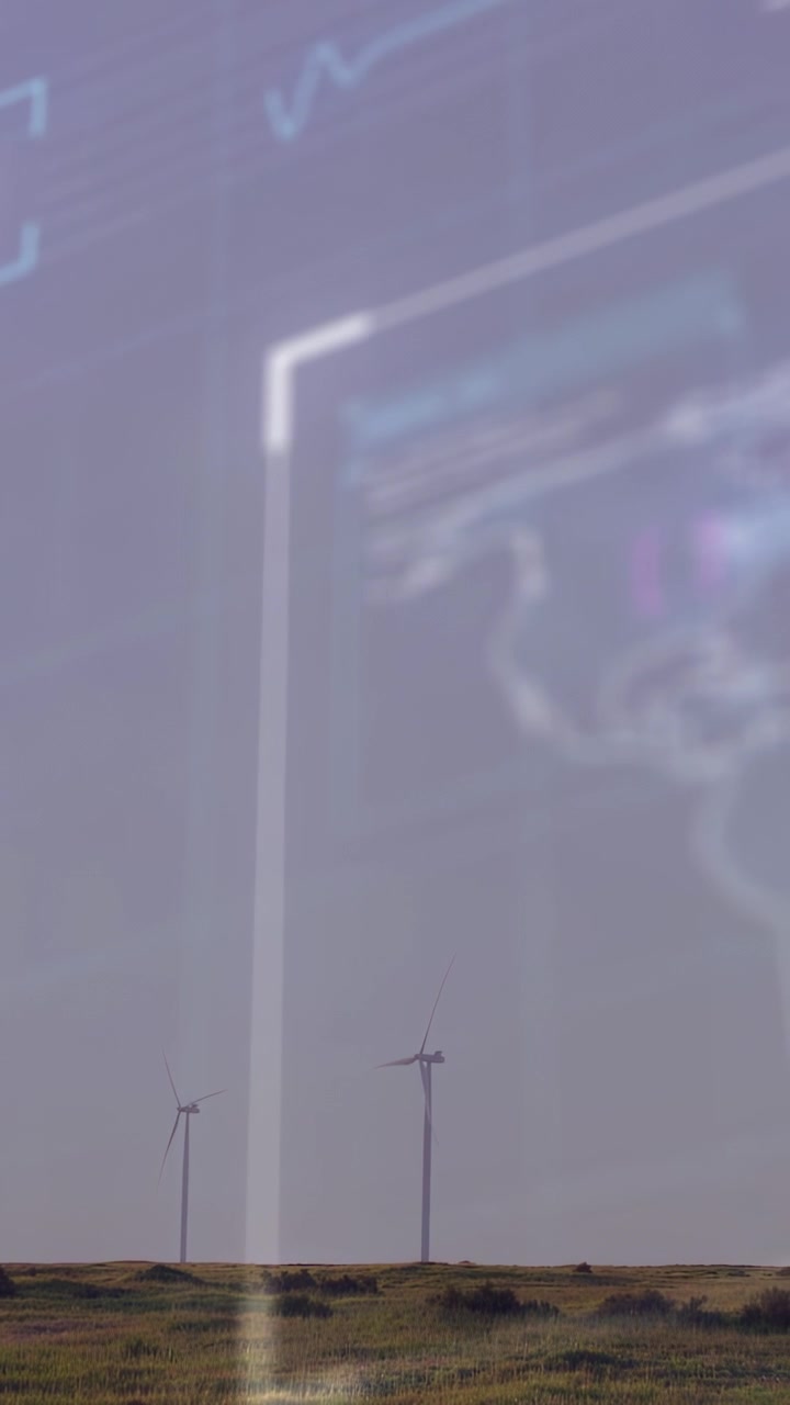 Video verticale: Mentre la telecamera centra l'orizzonte, turbine che girano, con un overlay che si sposta per visualizzare i dati del vento.