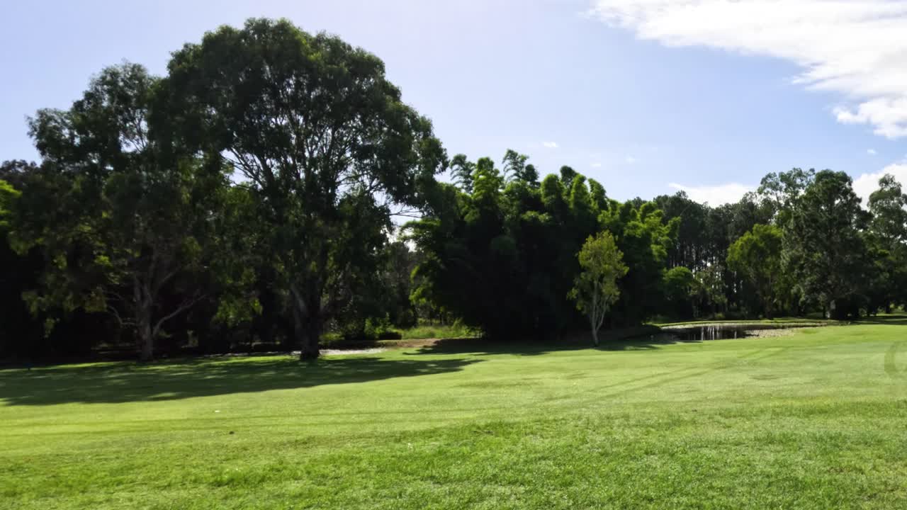A serene sweep across a lush golf course
