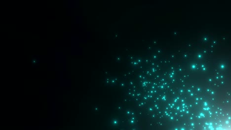 pequeñas partículas azules y estrellas en fondo oscuro