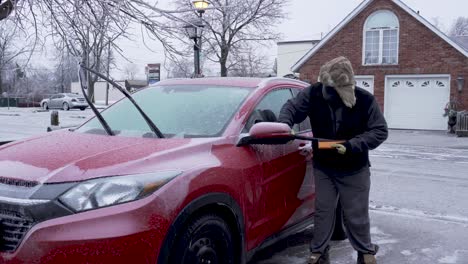 scraping ice from car