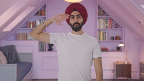 orgulloso hombre indio sikh saludando