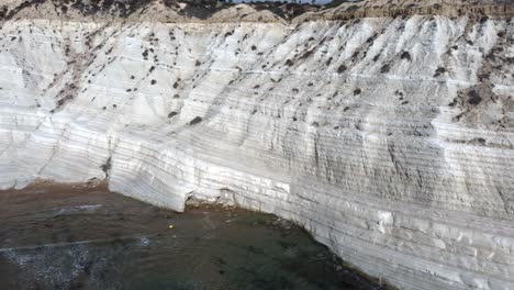 lateral dolly away from the eroded white cliff staircase of the turkish steps