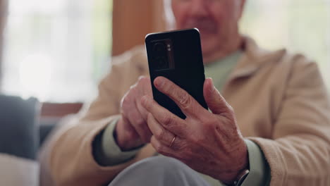 Parkinsons,-smartphone-and-hands-of-senior-man