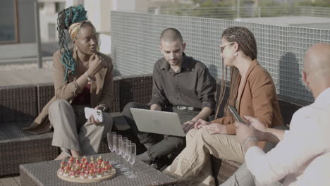 group of happy diverse office workers having party outdoor