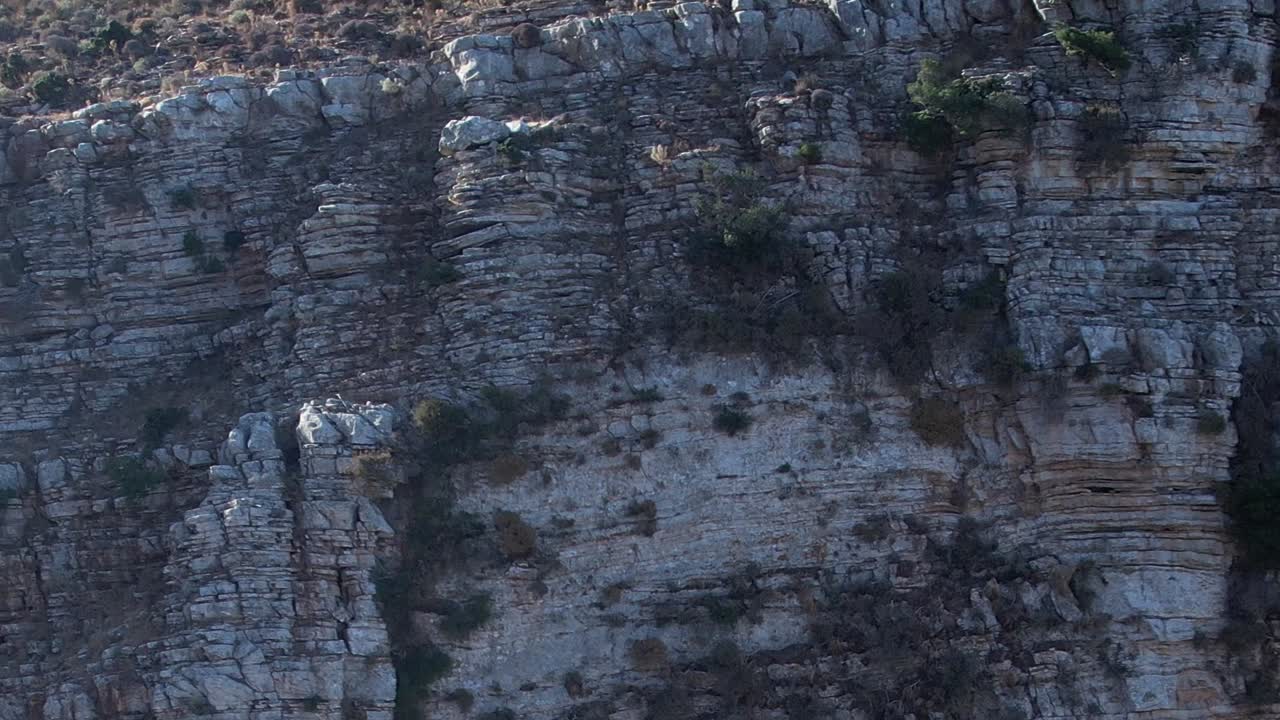 Aerial view of rocky cliffs in Greece showcasing natural landscape