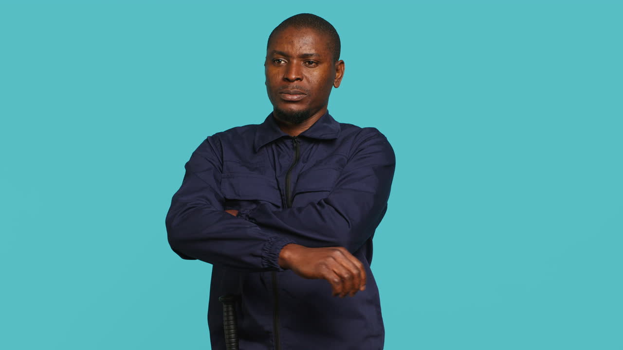 Portrait of smiling security agent securing assigned post