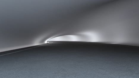 empty asphalt road floor with curved concrete wall background in tunnel or showroom.