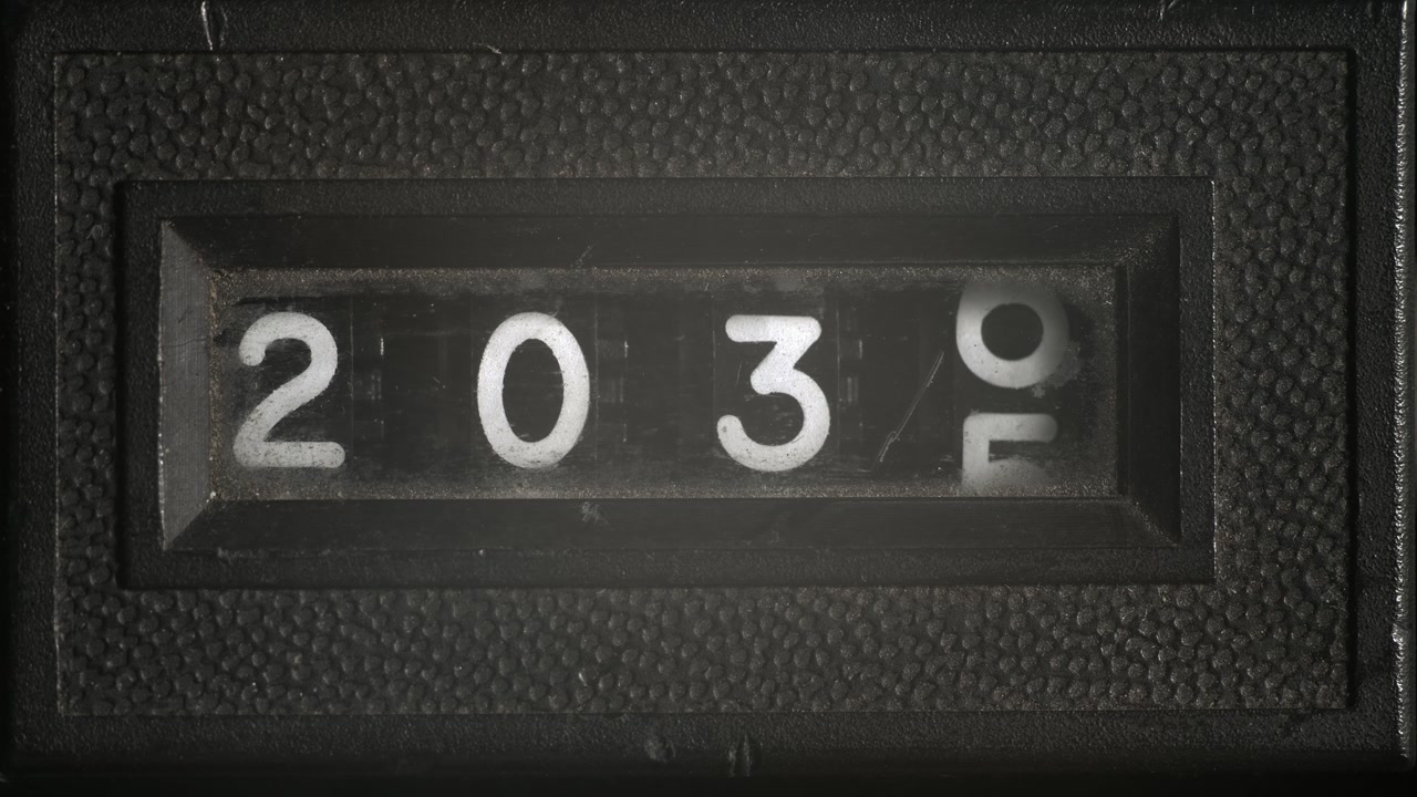 Close-up of an antique mechanical counter scrolling from 2030 to 2040. Retro numeric display used in year counters, film editing, stop motion, timing, or industrial measurement.